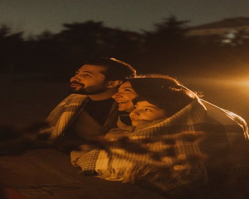 Family spending quiet time together in the evening
