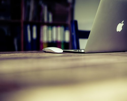 Closing laptop to define the end of work hours